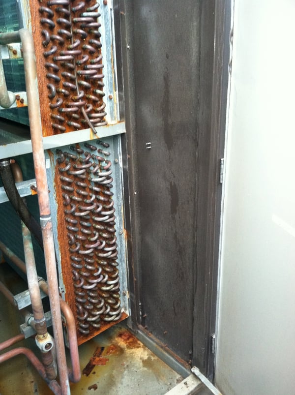 chloramine damage, chloramine corrosion, pool dehumidifier evaporator coils, rusty evaporator coils, rusty pool HVAC
